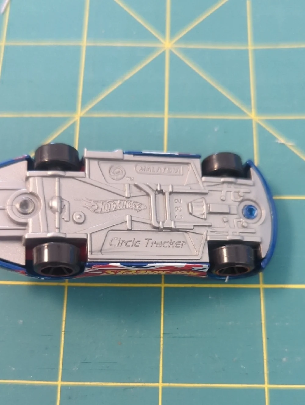 2010 Hot Wheels Circle Tracker Blue Race Car